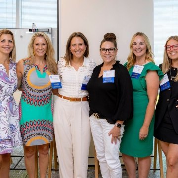 Women posing in a group photo