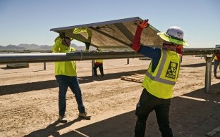 construction workers working on a solar job site