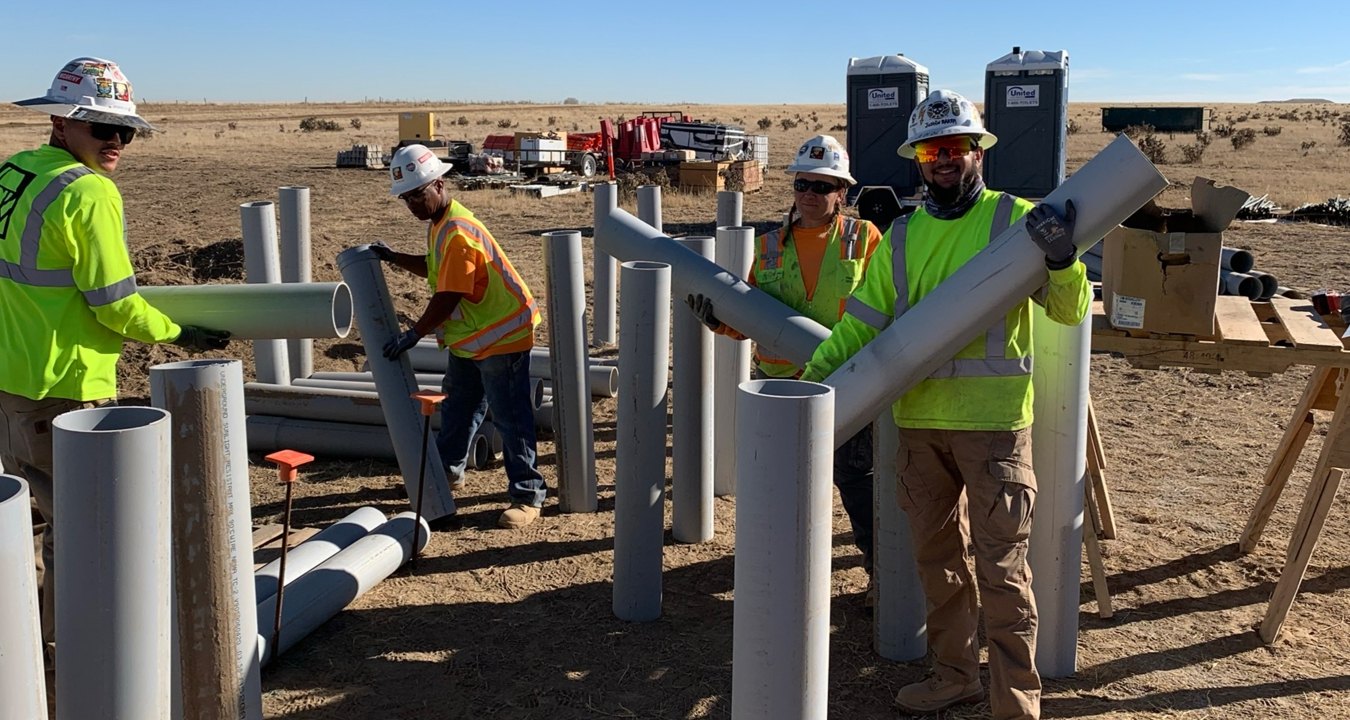 Construction workers at a solar jobsite.