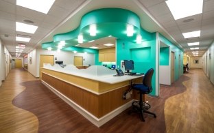 A nurse desk with bright green walls