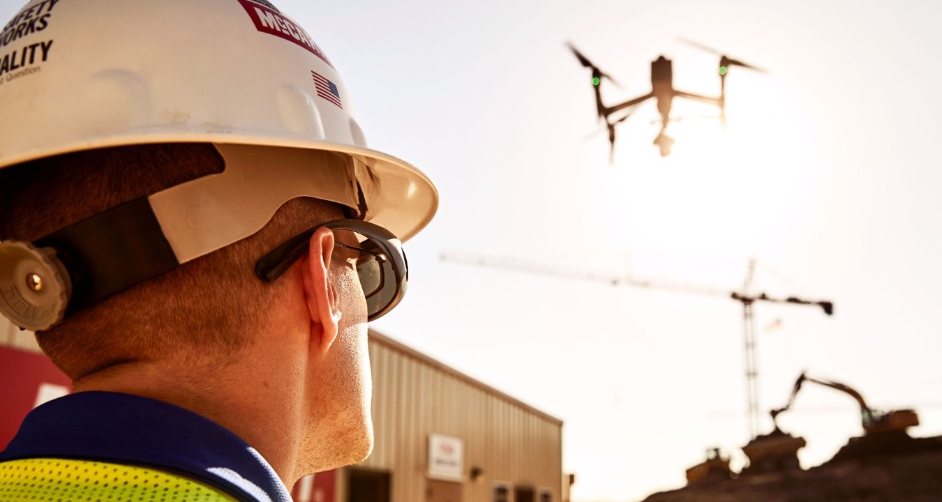 man flying a drone