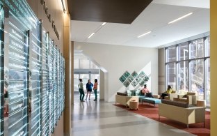 Indoor image of a hallway with one side open for general seating