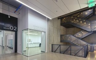 Indoor image of a staircase and a classroom