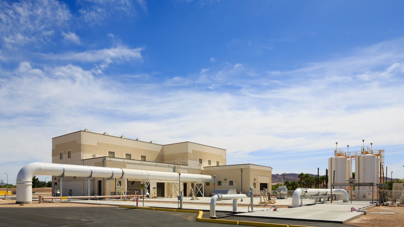 Exterior view of a building with pipes in front of it